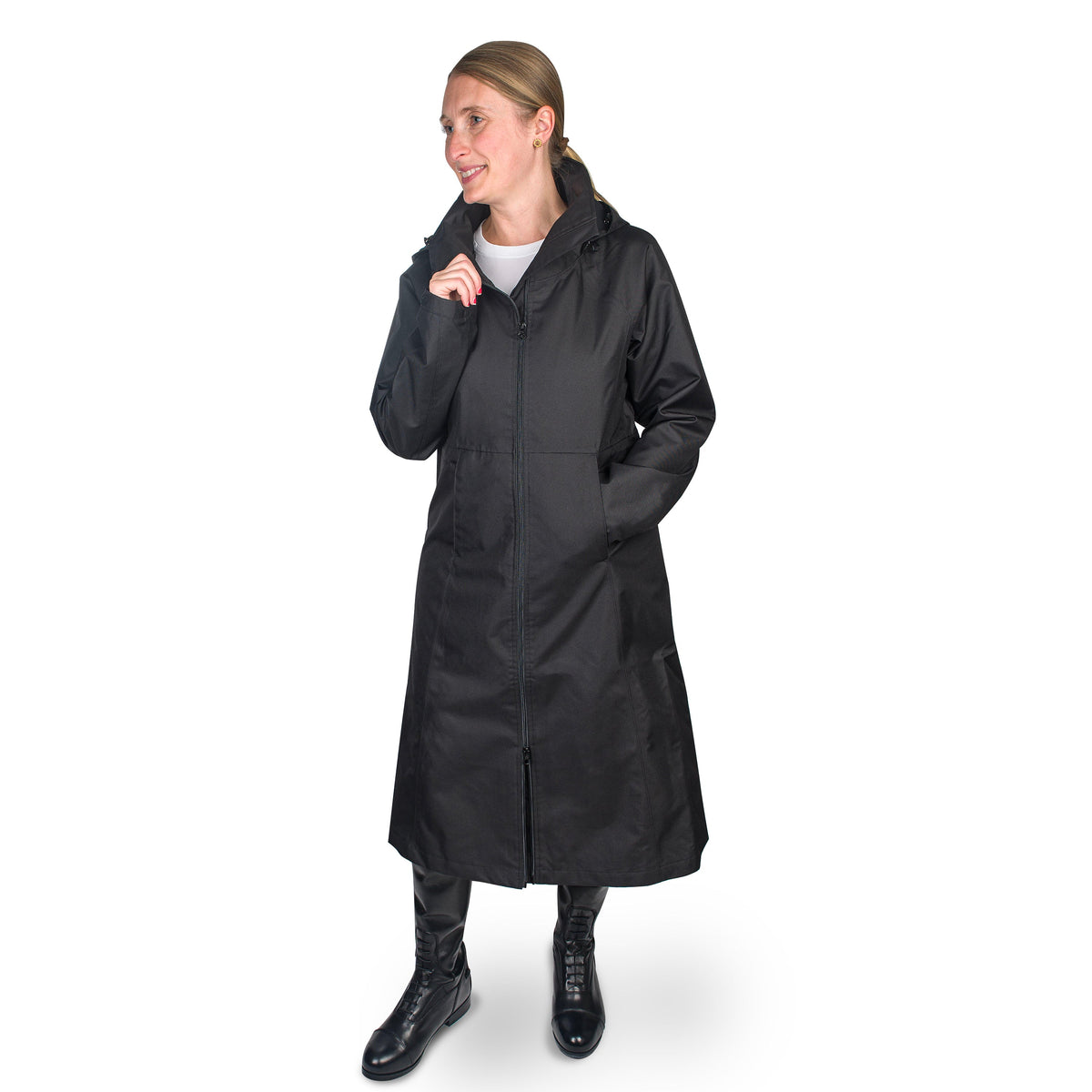 Black long hooded raincoat with a full zip, worn on a smiling model, front view on white