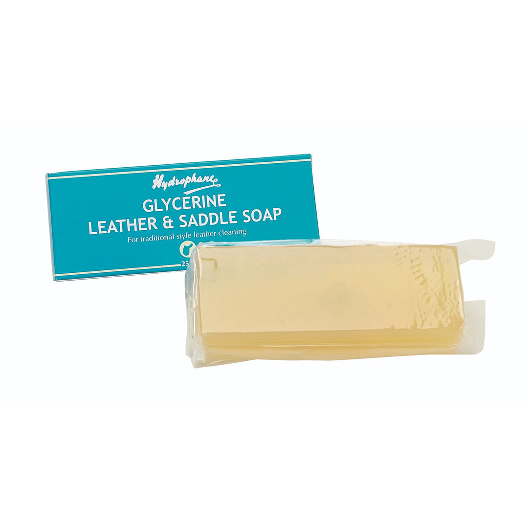 Translucent amber bar of saddle soap in clear wrap with a teal Hydrophane label, on white
