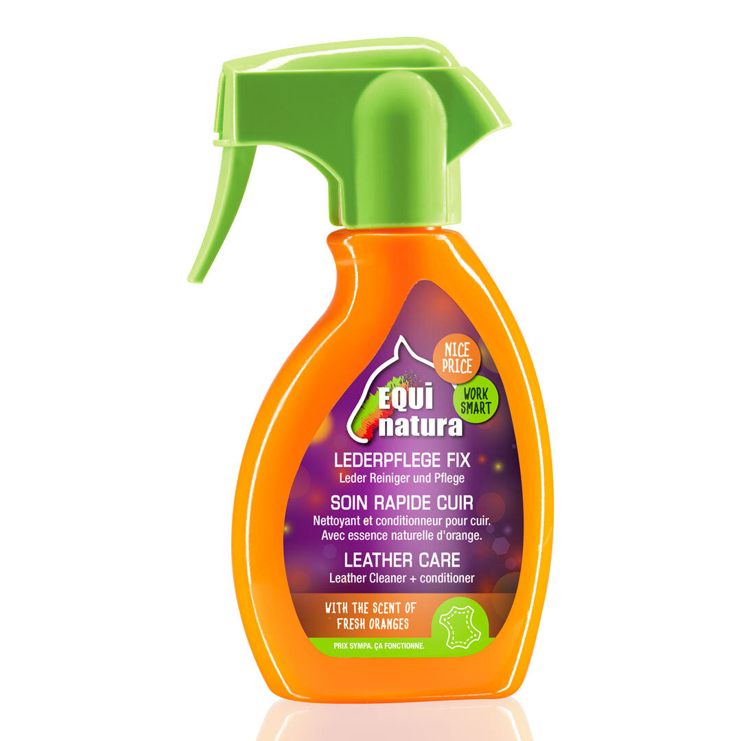 Orange spray bottle of Equi natura Leather Care with a green trigger and purple label, front view