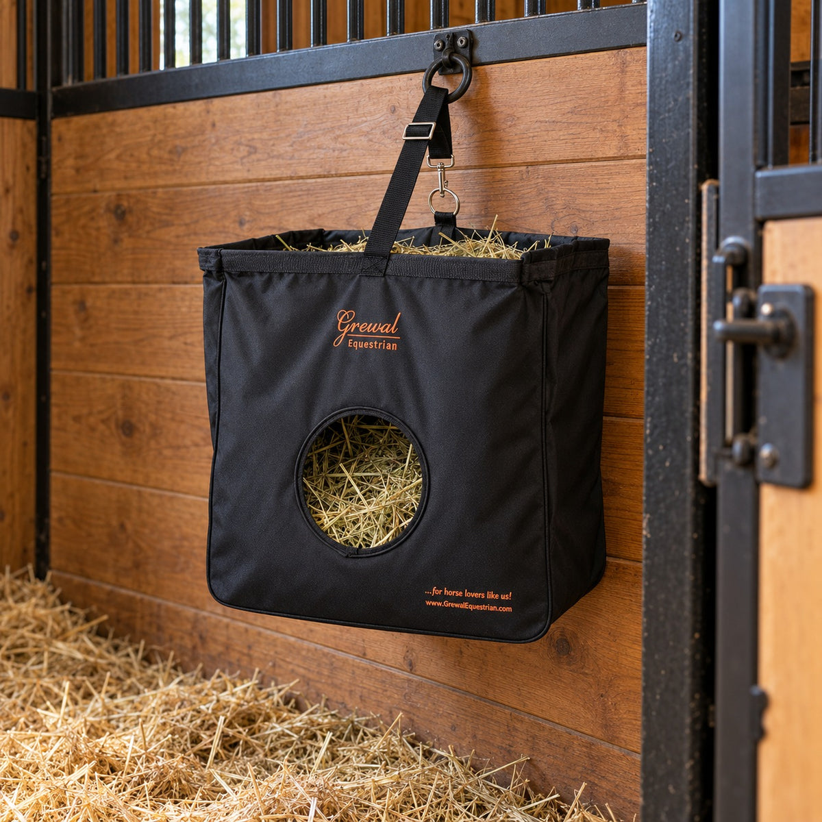 Grewal Large Black Hay Bag hanging filled with hay in a stall