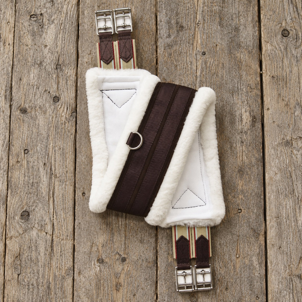 Ovation Dry-Tex Equalizer AP girth with white fleece and brown band on grey barn boards