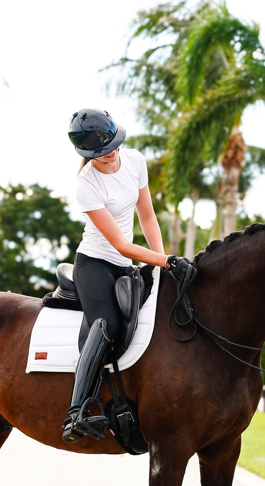 beige short sleeve equestrian riding top styled for warm weather riding