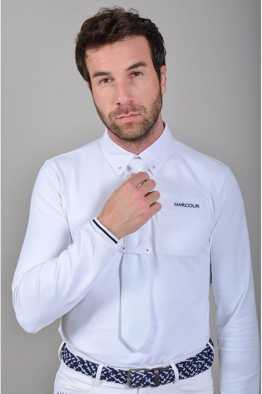 White long sleeve competition polo with a white tie and Harcour chest print, front view on a model